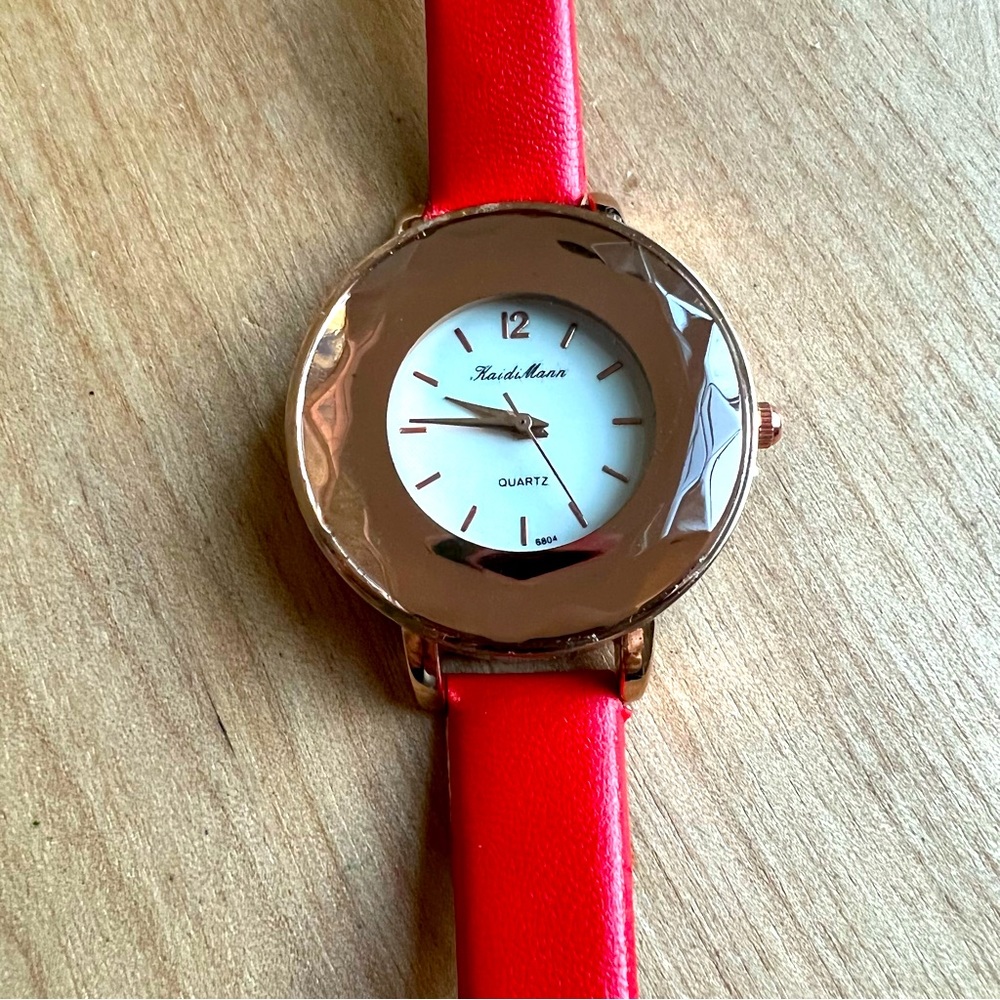 Kaidi Mann ladies rose gold tone red watch NEW BATTERY